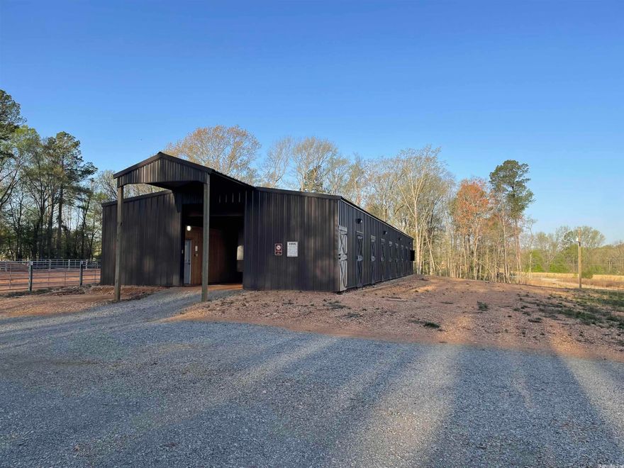 9.03 Acres. 3888 sqft (36’ x 108’) Insulated Barn Eleven 12’x 12’ Stalls with French Drain System, Doors have windows to allow natural light, RV/Trailer Electric Hook Up, LED lighting inside the barn, Outdoor LED flood lights, 3 Garage Doors, Natural Gas, ATT Telephone Land Line & Internet, Water, 1000 Gallon Septic Tank, 12’ x 36’  Room, Kitchenette w/Half Bath, Wash Bay. Absolutely Incredible Property.