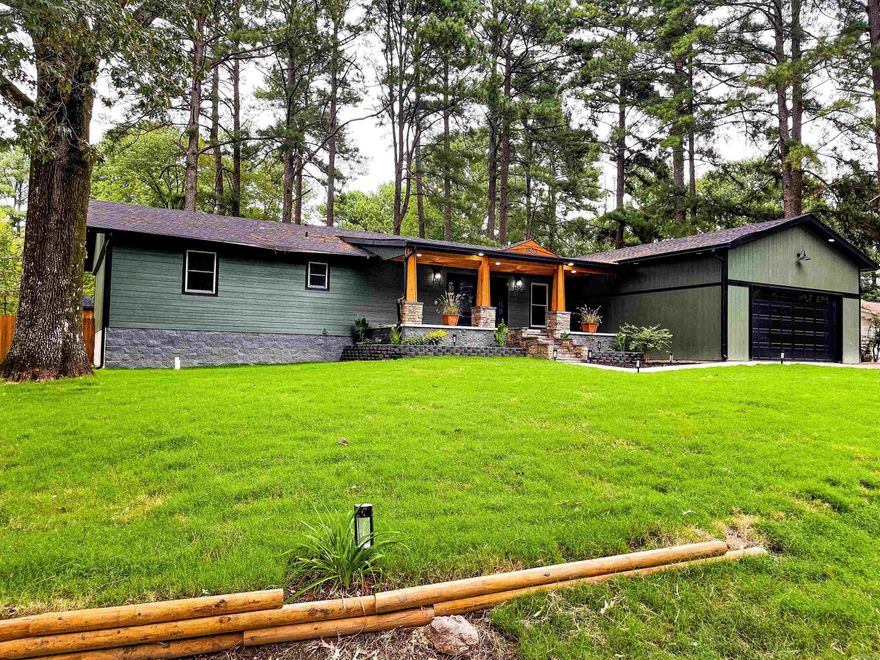 FULLY REMODELED with 2 primaries! Nestled in a serene neighborhood, this home feels cozy while having plenty of space. A concrete driveway leads to a 2-car garage, while the front porch overlooks the beautiful lawn. With 4 bedrooms and 3 newly remodeled baths, the open floor plan creates a seamless flow. One primary has enough room for a sitting area and the bathroom is a 24X32-ft oasis with a jacuzzi tub and walk-in shower. A spacious walk-in closet and a possible second utility closet offer storage. The expansive living room is perfect for gatherings, off the kitchen is a covered deck and a concrete pad perfect for entertaining. Leathered granite countertops and a 48-inch gas stove add luxury. This home combines comfort and style. Refrigerator conveys with home *Seller offering $10,000 to help with buy-downs or closing costs*