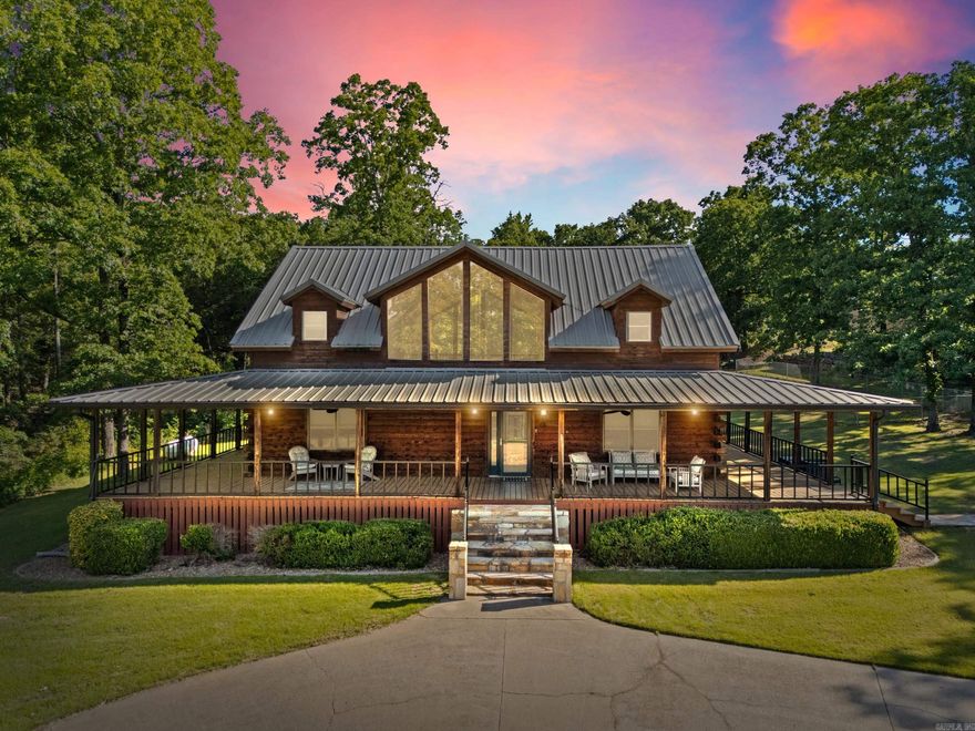 Motivated Sellers. Escape to your own retreat on 5 acres just outside of town! This stunning log home features a paved driveway, a wet weather creek, an above-ground pool, and a fenced yard for peaceful days by the water. Unwind on the wrap-around porch or fire up the grill in the cozy covered grilling nook. A 4-car detached garage with partially finished living space above adds even more charm. The 30x40 shop with soaring 14' ceilings is heated/cooled and perfect for all your hobbies. Inside, enjoy 3 spacious bedrooms with walk-in closets, updated bathrooms, and a beautifully refreshed kitchen.  A separate drive leads to the shop with plenty of space for all your projects. Just 2 miles from Cow Shoals for world-class fly fishing and 6 minutes to downtown Heber Springs!