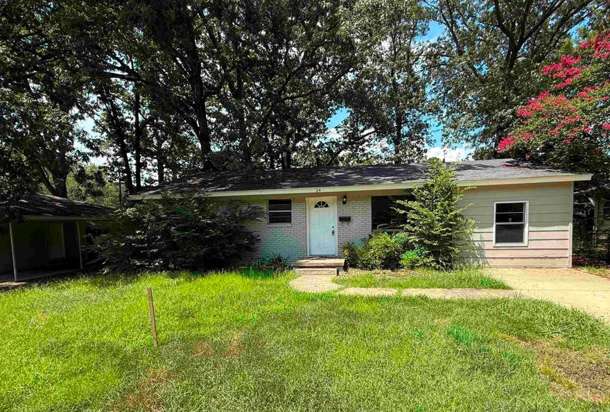 Charming 3-bedroom, 1.5-bath home with 1,175 sq ft located in an established, tree-shaded neighborhood in Little Rock. This well-maintained property features updated flooring throughout, a spacious kitchen with ample cabinet space, tile backsplash, gas range, and a double sink. Bright living and dining areas offer natural light and an open feel. Primary bedroom includes a half-bath en suite. The full bathroom is centrally located and easily accessible from all bedrooms. Exterior features include a large, level front yard, a shaded backyard with mature trees, and driveway parking. Additional amenities: central HVAC, laundry hookups, and a low-maintenance brick and siding exterior. Convenient to schools, shopping, and commuter routes.