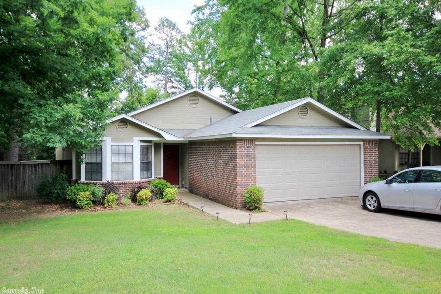 Darling one story home with cathedral ceiling, gas fireplace and ceiling fan in the great room!  French doors leading to the patio and back yard.  Eat-in kitchen with large bay window, pantry and tile flooring.  Refrigerator will convey with the home.  Master bedroom has ceiling fan and large walk-in closet off of master bath.  All bathrooms have tile flooring and tub/showers.  Nice patio off back with large fenced-in back yard.  New roof in 2009, new air compressor and garbage disposal in 2013.