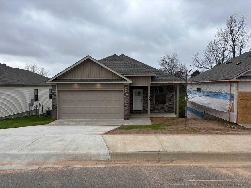 New construction with 3 bedrooms and 2 1/2 baths.  Superior quality finishing throughout including granite counter tops in the kitchen, luxury vinyl floors and upgraded plumbing fixtures.  The primary bedroom is located on the main level offering his and he sinks plus a tub and separate shower. Two car garage.  This lot is approximately 150 feet deep.