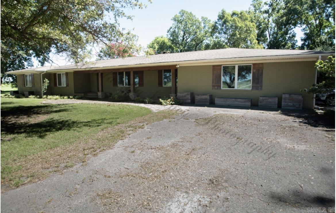 Attention duck hunters, farmers, and nature lovers, you don't want to miss out on this gorgeous home and land. Of the 137 acres, 55 acres includes prime timber that is flooded every year for ducks. It has been leased out for ducks for numerous years. Huge shop to work out of or to store all your hunting toys. Huge mature Pecan trees provide excellent shade to sit outside and breath fresh air. A beautiful 3,847 sqft 3 bath 3 bed home provides enough room for all of your hunting buddies or to raise a family. If farming or gardening is something you like, 35 acres of the 137 provides excellent soil for growing crops. Call today to schedule your showing. Beautiful Mature Pecan Trees surround the beautiful Home!! Ladies the Master Bed and Master Bathroom and Huge closets are something like you have only dreamed about !! The Family Room is perfect for all your Family Gatherings and Holiday events With Plenty of Space ! See Agent Remarks