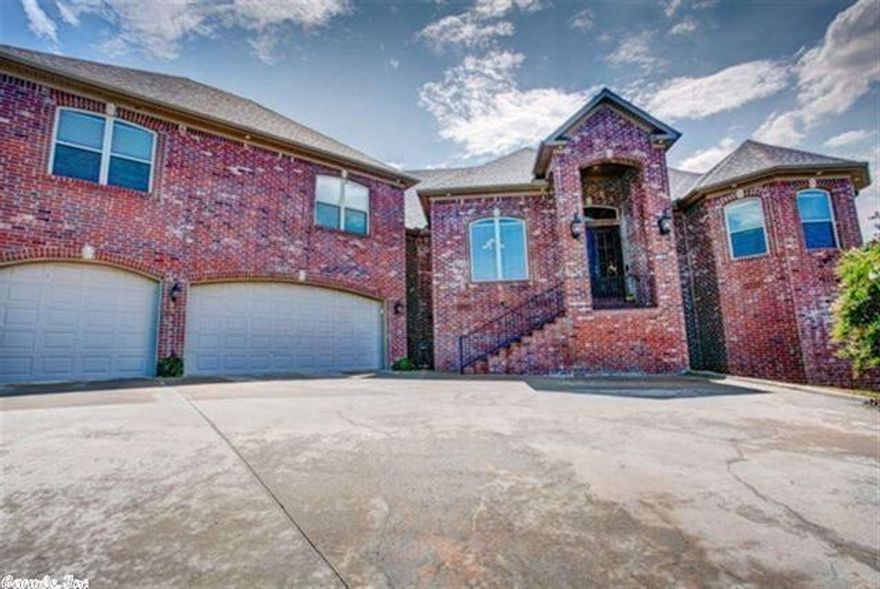 This stunning home has extensive and unique architectural detail and is a must see. Gorgeous stone flooring, all new carpet up. Open floor plan great for entertaining. A chef's kitchen opens up to the family room. There are 5 beds, 4 baths, with a fabulous master bath and a HDTV behind the mirror. Large media room.  Lots of details.  Located in a quiet cul de sac with breathtaking views. Security System, Sprinklers & tons of storage.