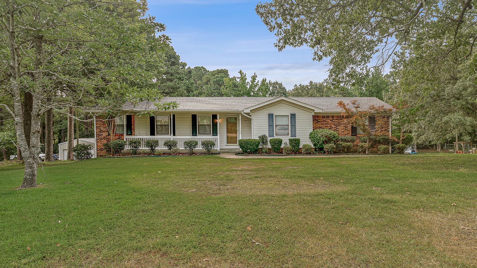Welcome to this inviting ranch-style 3 bed, 2 bath home on the south side of Jonesboro. Nestled on a spacious, tree-shaded lot, this property offers plenty of room to enjoy outdoor living with a brand new 8x16 back deck perfect for relaxing or entertaining. Out back you’ll find an 18x24 shop with a 10x24 open porch—ideal for hobbies, storage, or extra workspace. The 2-car drive-under garage provides convenient parking and additional storage. Inside, the layout is comfortable and functional with plenty of natural light. Enjoy the peaceful feel of the large lot while being close to schools, parks, shopping, and dining. Don’t miss your chance to make this south Jonesboro home yours!