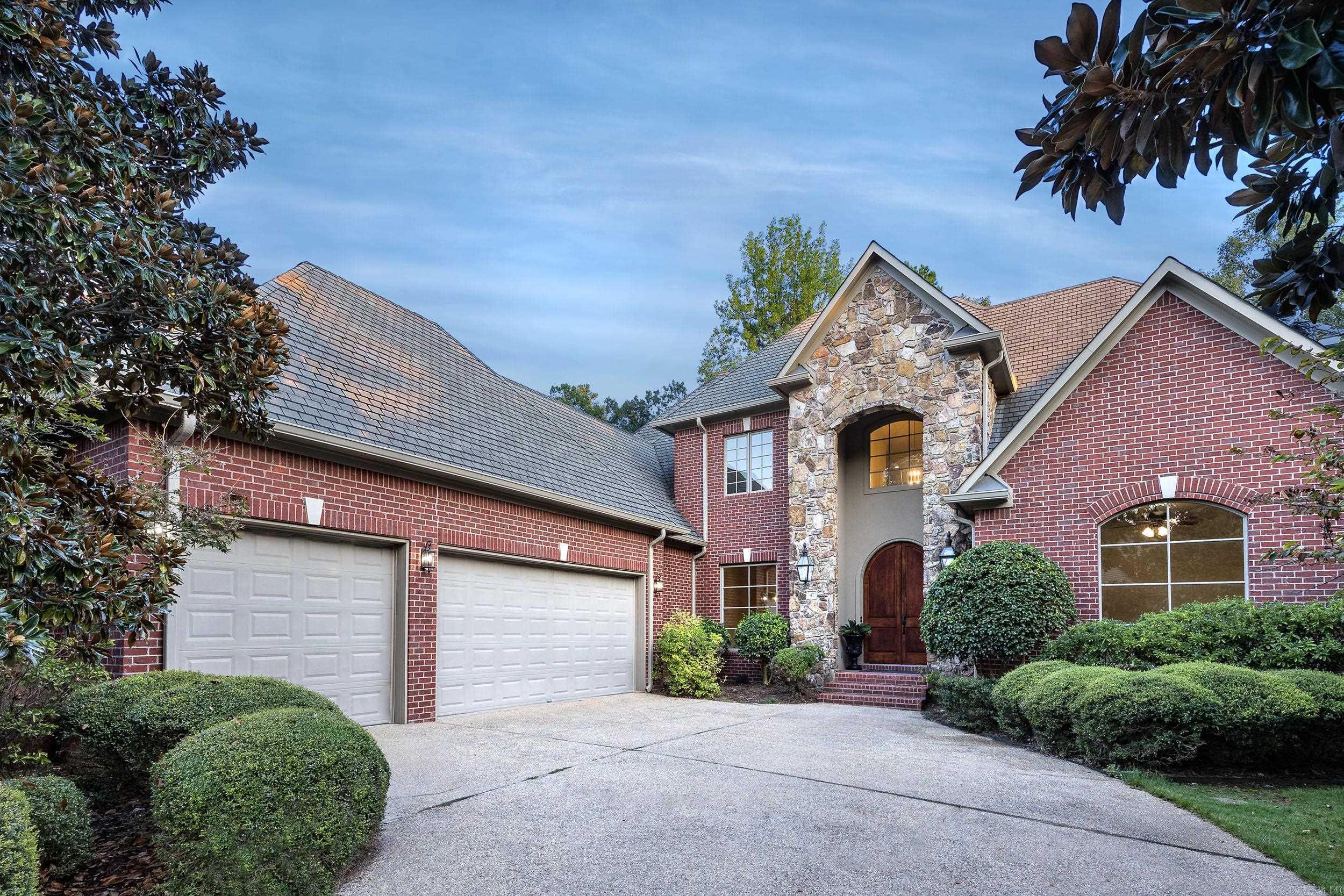 Welcome to 47 Quercus Circle, a stunning home that offers the perfect blend of luxury and comfort. This magnificent property boasts 5 BR, 3 full BA, and 2 half BA. As you step inside, you'll be greeted by soaring ceilings and a beautiful double door entry, setting the tone for the elegance that awaits. The open floor plan seamlessly combines the dining area and sunken living room, both adorned with massive windows that offer breathtaking views of Chenal CC Founders Course hole #2. Family and friends will be delighted by the oversized island and brand new appliances, including a refrigerator. The home has been thoughtfully upgraded with new countertops, fresh paint throughout, new lighting fixtures, new carpet, new HVAC unit, and even a new electric fireplace in the hearth room. The real hardwood floors have been meticulously refinished. The primary suite is generously sized and features his and her closets, as well as a newly renovated spa-like bathroom.The main level includes a guest bedroom and bathroom, Upstairs, you'll find 3 BR/1.5 BA, and a media room that promises endless entertainment. Outside, the home offers a spacious patio. Call for gate code.