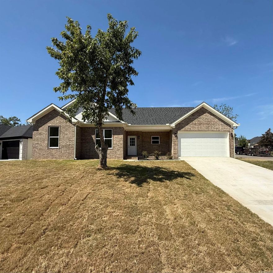 Welcome to 1400 Nicole Drive, a thoughtfully built new-construction home located in a quiet, well-established North Little Rock neighborhood. This inviting property sits on a corner lot, offering a little extra yard space and great natural light throughout the home. Inside, you’ll find a comfortable open floor plan that connects the living room, dining area, and kitchen — a great setup for both everyday living and hosting guests. The kitchen features marble countertops that add a clean, stylish touch, and the luxury vinyl flooring throughout offers durability with a modern look. Whether you're relaxing with family or enjoying a casual gathering, this home’s layout makes it easy to feel connected and comfortable.