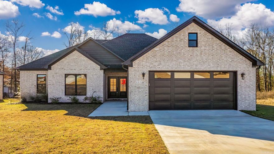 Beautiful new construction home in Hidden Valley Estates! Hardwood look tile, quartz countertops, custom cabinets, custom trim, beams and shelves, to match the custom vent-hood, HUGE custom tiled shower, large pantry, large closet and stand alone soaker tub in primary that connects to the laundry room! NextGen water proof wood floors throughout! Living room boasts brick fireplace & coffered ceiling in living room, large covered back porch, soffit/eave can lights, oversized garage and tons more. Builder has installed full privacy fence! Call today! This one won't last long!