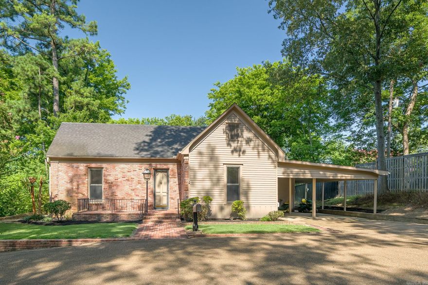 Beautiful home nested into a private cove right in the middle of Forrest City!  Recent improvements include fresh exterior paint and repairs. Fresh interior paint on walls, trim and ceilings. New Carpet. New Hot Water Tank. Updated Baths. This is a VERY large 2 bedroom home. The main bedroom has a giant closet that could be used for many purposes - even an office! The main living space is grand with high ceilings.  Natural light flows wonderfully through the home and the screen porch is perfectly secluded and in a great spot to catch the evening sunsets.