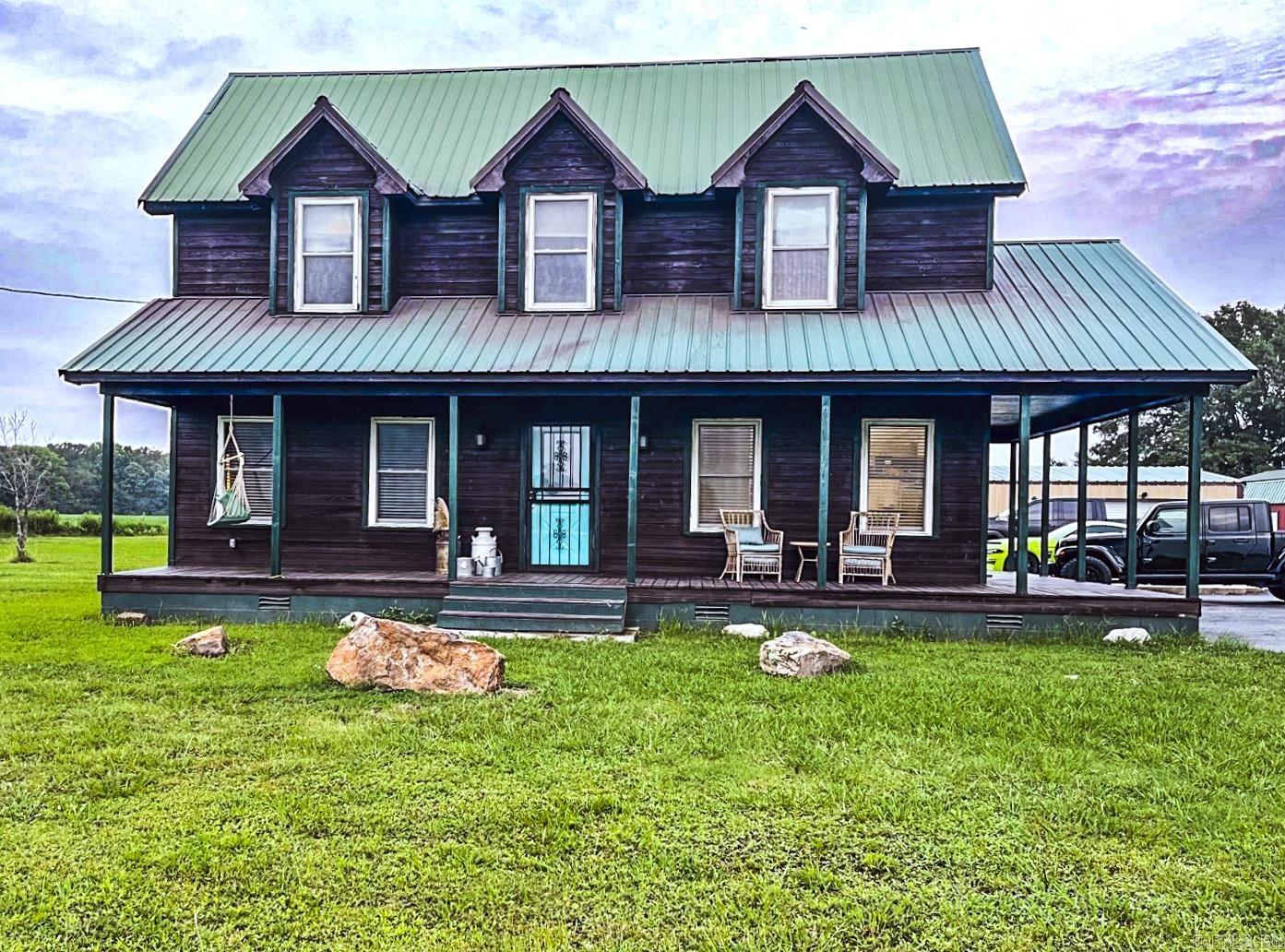 Homes like this well maintained beauty don't come around often. This property boasts 4 bedrooms (owner turned one of the bedrooms into an extra large closet) and 2 bathrooms and sits on 2.4 acres. You will love the cedar counter tops, extra large living area, updated doors and cabinets, and the 30X40 shop. Call your favorite agent to setup a showing today before it is gone. Property is being sold AS-IS.