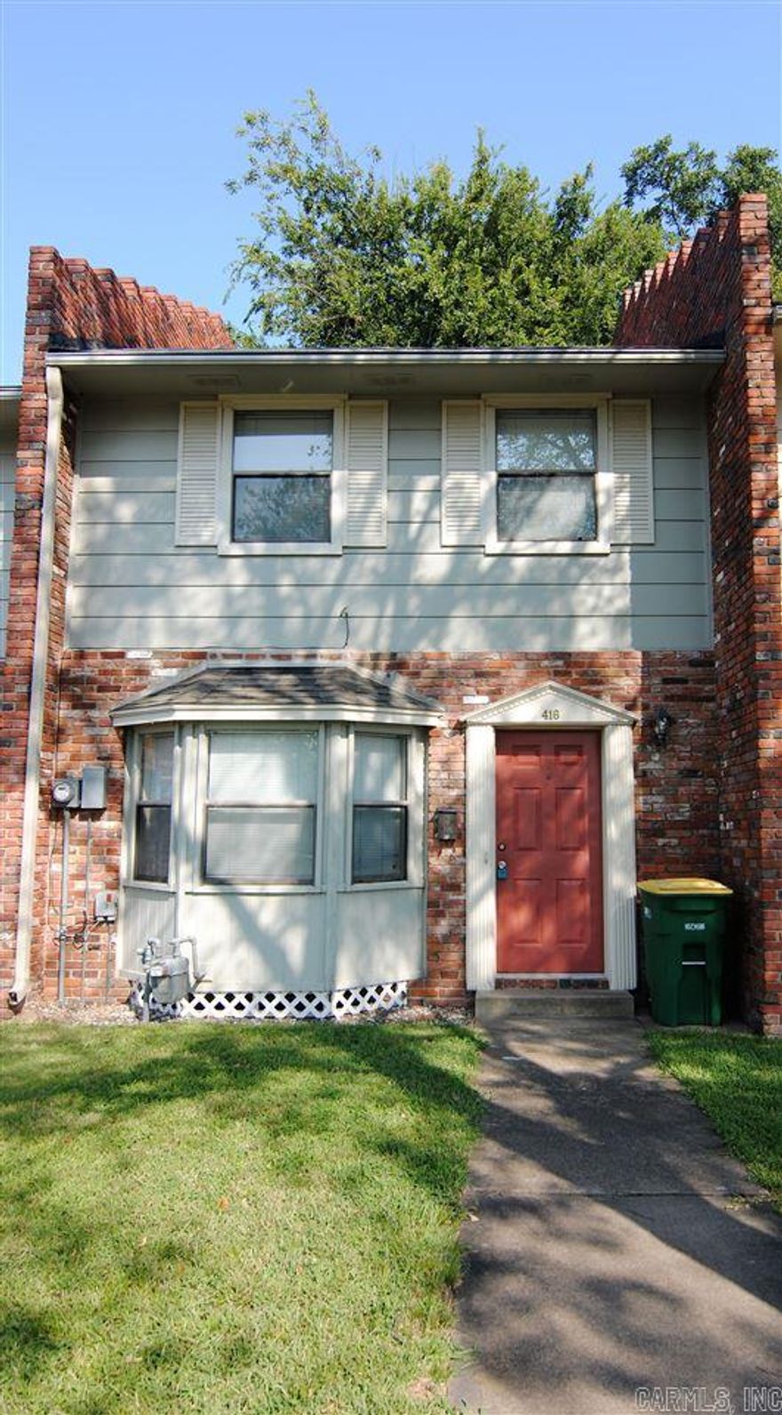 Spacious town home in the Historic Argenta District.  2 blocks to Dickey Stephens Ballpark, 3 blocks to Main Street.  Large living area with picture window, 1/2 bath down, furnished kitchen w/extra pantry & washer/dryer closet (hookups only-electric).  Two bedrooms upstairs each with private 1/2 bath and entry to bath/shower. Fenced Back Patio w/Storage. Assigned parking-2 spots, lawn care included. (Note. Sample Photos used for Bedroom 2, Kitchen and Bathrooms)