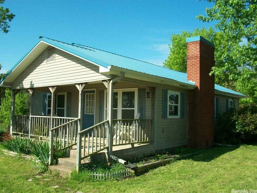 This 2 Bedroom 1 Bath sets on 32 Acres that is criss-crossed with 4.5 miles of hiking trails that are marked with colored paint for each trail. There are several rest spots along these trails with benches and camp sites throughout the property. This  is a dream property for that nature enthusiast. There are over 100 types of birds sighted & 250 different kinds of wild flowers, all located in the great Ozarks. The home has been remodeled and a new metal roof on home and all out buildings on property.