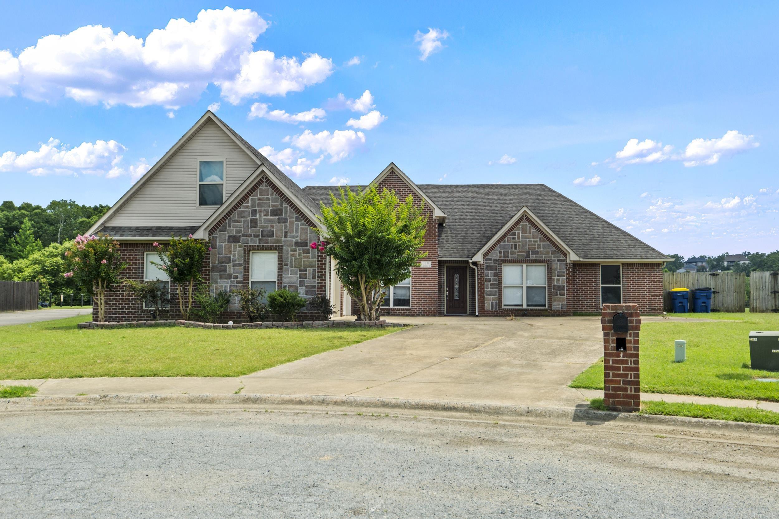 Come see this spacious 4 bedroom home that backs up to the lake in Magness Creek! Granite kitchen countertops, formal dining room, breakfast bar, 2 fireplaces, bonus room, 2 car garage plus parking pad are just a few of this home's features. The huge back yard is completely fenced and also has a large covered back patio. Perfect for anyone who enjoys time outdoors or just entertaining guest! Just a few steps away, you will find a playground offered by Magness Creek!