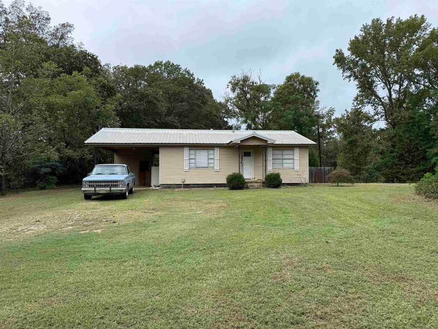 Acreage!! Come see this cute, well maintained, move in ready, older home on almost 5 acres with a pond. Located in the well desired Ouchita school district. The property is fully fenced ready for livestock or horses. There is a great building site for a future home with no restrictions as well. This 2 bed, 1 bath has all hard surface flooring. Spacious kitchen and living room. All appliances stay including the washer, dryer and upright freezer. Fiber internet and just minutes away from dining and shopping. Agents see remarks for more details