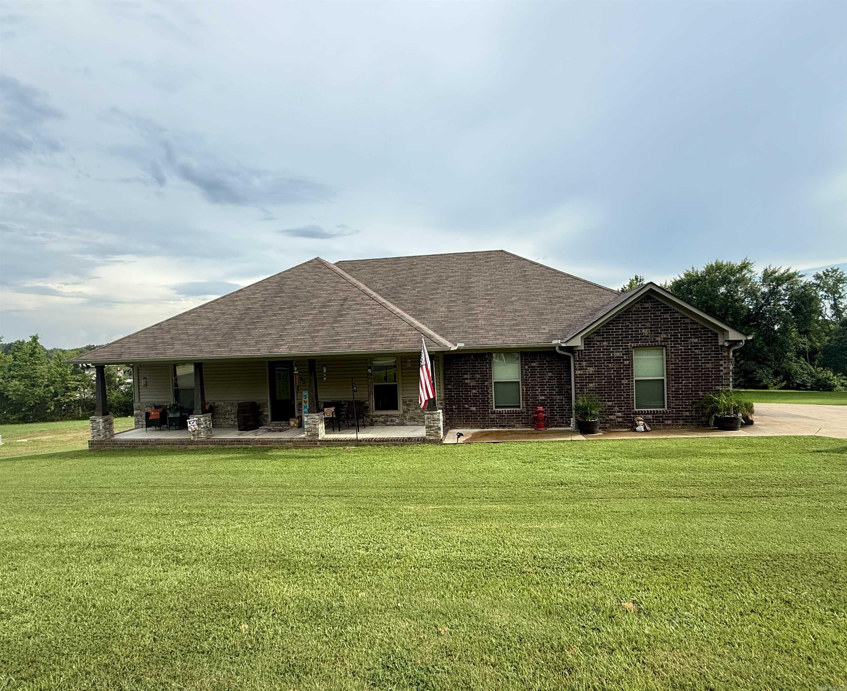 Charming, spacious, and full of character!!! Ready for its new owners! This 2,107 sq ft home near Wooster Elementary blends peaceful country living with city convenience. The main level offers 1,824 sq ft with 4 bedrooms, 2 full baths, and an open-concept layout that seamlessly connects the living, dining, and kitchen areas. A beautiful stone gas fireplace adds warmth and style, while large windows provide views of the expansive backyard. The finished basement includes 283 sq ft worth of bonus room, half bath, patio access, and a small bonus garageāperfect for a guest suite, office, workshop, etc. Set on a generous lot, this home offers comfort, flexibility, and space to enjoyājust minutes from Greenbrier or Conway!