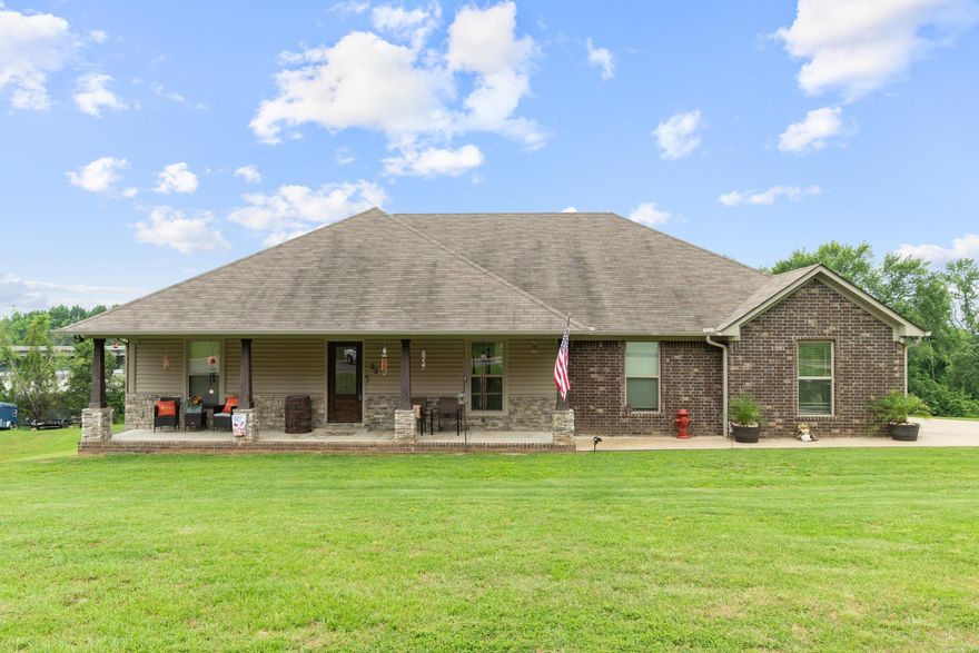 Discover the perfect blend of peaceful country living and convenient access to city amenities in this beautiful home next to Wooster Elementary. The main level boasts approximately 1,824 sq ft with 3 spacious bedrooms/2 full baths. You'll love the open concept layout, where the living room, dining area, and kitchen flow seamlessly together. Ideal for entertaining or everyday living. Enjoy views of the expansive backyard or cozy up by the stunning stone gas fireplace that anchors the living space. The finished walk out basement adds valuable flexibility with an estimated 283 sq ft, featuring a bonus room that functions perfectly as a 4th bedroom or private guest suite. Complete with a half bath, it offers direct access to a charming patio and small garage. Perfect for hobbies, storage, or work room. Don't miss your chance to own this inviting home that offers space, comfort, and versatility. Within walking distance to the school and a short drive to town!