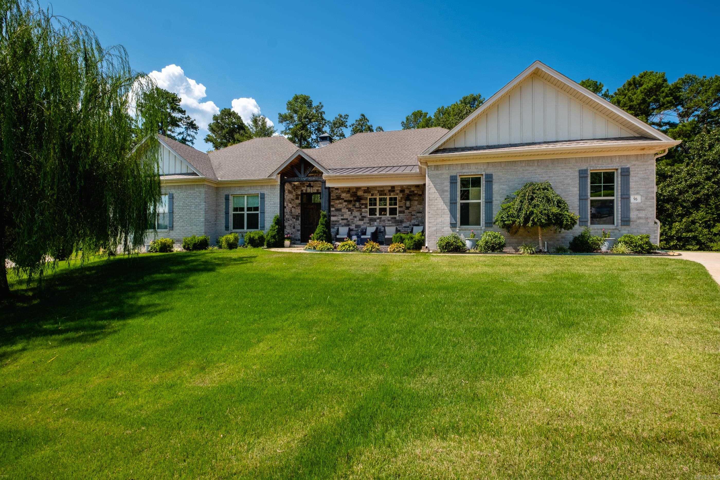 Welcome to this beautifully crafted home in The Ranch, nestled on a spacious 1-acre lot. This thoughtfully designed single-story home offers an open concept layout thatās perfect for both everyday living and effortless entertaining. Inside, you'll find a versatile split-bedroom floor plan featuring two spacious guest rooms with a shared bonus living space-ideal for a playroom/media area. A separate room provides flexibility as a 4th bedroom or a private home office. The primary suite is designed for comfort and style, showcasing a spa-like bath. Stunning kitchen combines style and function with beautiful quartz countertops, custom cabinetry, and a large center island with built-in shelving. Polished concrete floors flow throughout the home. Enjoy peace of mind with an interior storm shelter, and take in the outdoors from the large covered patio overlooking your private backyard. The expansive 3-car garage offers ample space for vehicles & storage. Best of all, enjoy neighborhood access to scenic fields and forestāideal for walking, biking, fishing, or canoeing. Donāt miss this rare opportunity. Zoned for Don Roberts and Pinnacle View.