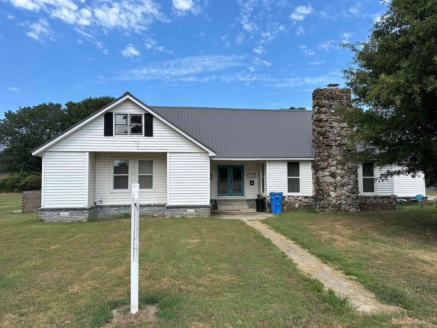 Home with lots of room for a growing family also nice yard to play in.