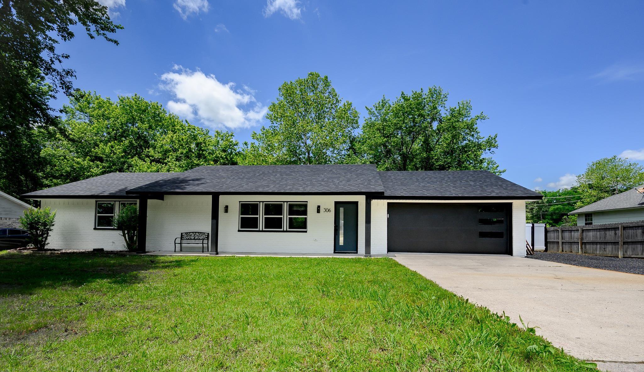 Absolutely STUNNING, TURN-KEY, 4bed/3bath home on a quiet cul-de-sac. This Complete Remodel was expertly and thoughtfully completed, featuring countless attractive modern design features! The home includes NEW windows and doors throughout, luxury vinyl flooring, new fixtures, attractive paint inside and out, and ALL NEW APPLIANCES. The beautiful kitchen features gorgeous quartz countertops, new attractive cabinets, and nice touches such as under cabinetry lighting, and built in electrical outlets in the island! Recessed lighting has been tastefully added throughout the build. The open concept living area features large windows and tons of space for relaxing or entertaining. There is a spacious, private master suite as well as 3 additional large bedrooms! The bathrooms feature lighted bathroom mirrors, brand new sinks, toilets and showers/bathtubs, and lovely lighting fixtures. The electrical and plumbing have also been completely updated. There is a brand new HVAC, tankless water heater, vinyl fencing, and ROOF! The home has a 2-car garage that has also been redone. If you’re looking for a picture perfect home just minutes to town, this is it!