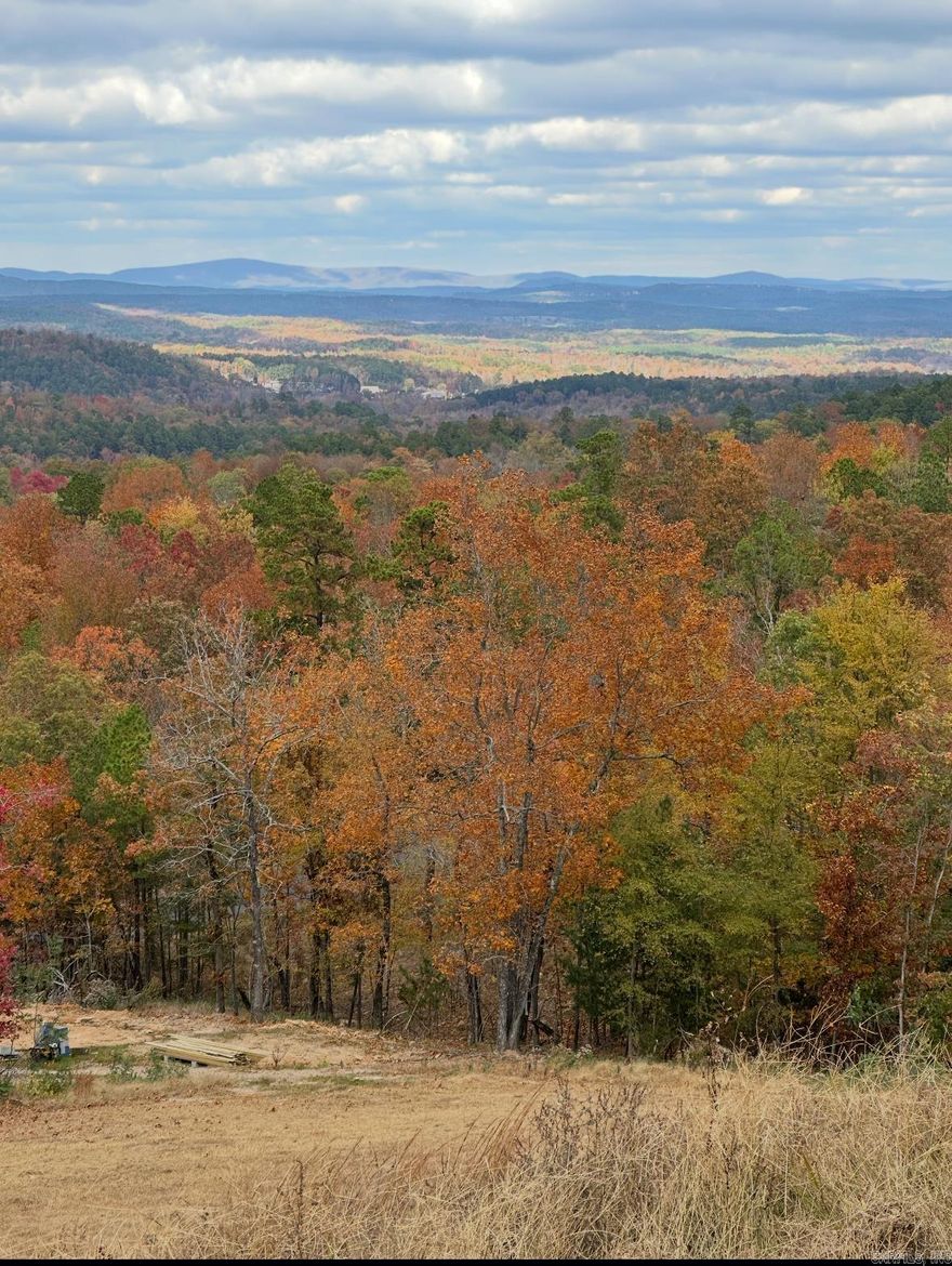 MOUNTAIN TOP - GREAT BUILDING SITE - 3 ACRES!  6 miles from downtown Hot Springs National Park!   Breath-taking Views!  Area of Upscale Homes!  High speed Internet. City Water.  This lot has street frontage on (2) sides.  Subdivision restrictions allow nightly rentals.