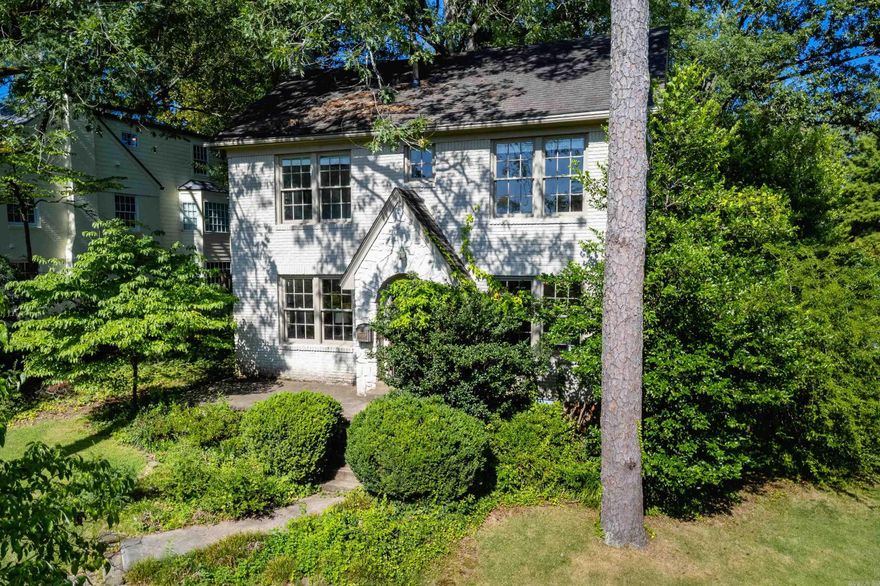 Great Heights home on wide corner lot. Large living room with fireplace. Dining room with lots of windows and light. 3 bedrooms with full bath on 2nd level. Fourth bedroom with full bath on 3rd floor is 350 sf and is not counted in square footage.  Den with half bath off kitchen. New paint and newly refinished hardwood floors. Detached garage. Sprinkler system. Generator. Two blocks from CCLR so bring your golf cart! Super Charming!