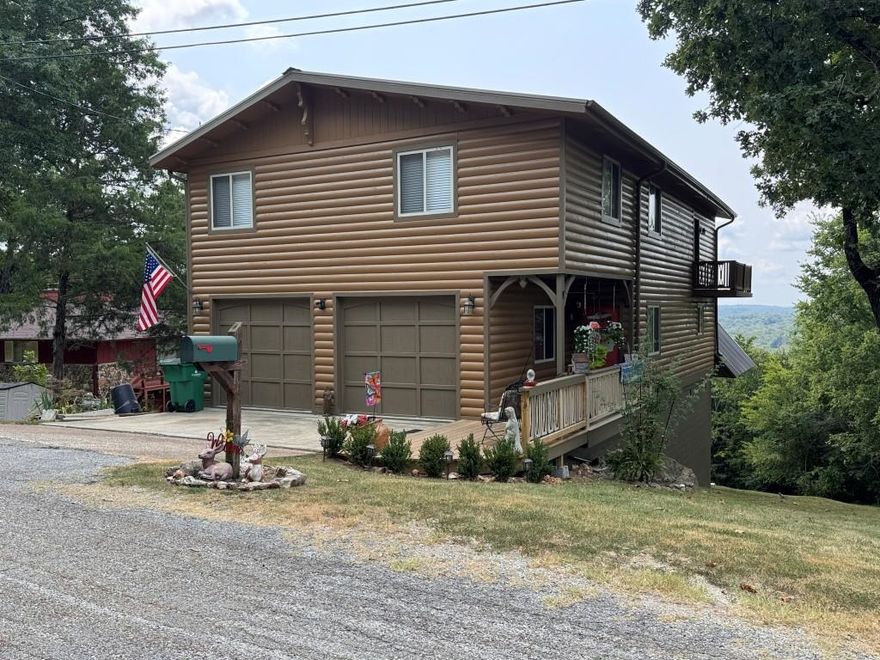 This freshly remodeled home features 4 bedrooms,  3 full baths, attached oversized  2 car garage-all updated. With over 3900 sq. ft. m/l, there is plenty of room for comfortable living and lots of storage space. New flooring, paint, plumbing, all new deck were completed over the past year.   From that new deck is a  stunning  overview of Cherokee Village and the surrounding terrain. Watch eagles soar by and the setting sun dipping over the horizon while supping an evening treat. The main level is a semi-open floor plan with a vaulted ceiling living room, kitchen and breakfast nook, and dining area. A 4th bedroom, bathroom and laundry round out the main floor living area.   The large main bedroom is on the second level.  It's adjoining bath has both tub and separate shower and twin vanities. A reading nook provides both a scenic view and a cozy spot for relaxing with a good book and  morning coffee.  Two additional bedrooms and bath are also on this level. There is even a "parlor" perfect for an internet gaming enthusiast or just watching a good movie.