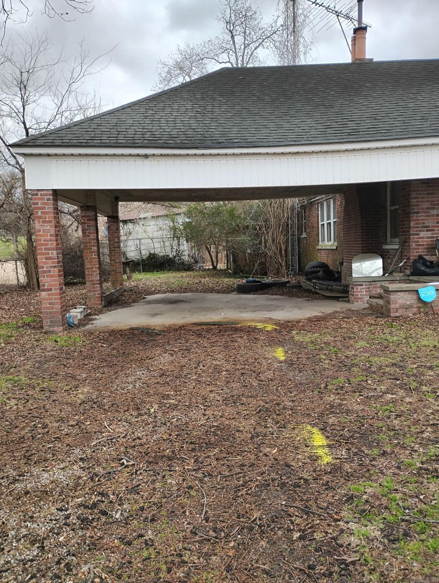 Investor special with tons of potential! This 3-bedroom, 2-bath home features hardwood floors, a convenient carport, and a layout ready for your updates. Enjoy two porches—one enclosed for added flexibility—and a fenced yard that offers privacy and space for pets, play, or outdoor entertaining. With some TLC, this property could shine as a great starter home, rental, or flip opportunity. Sold as-is.