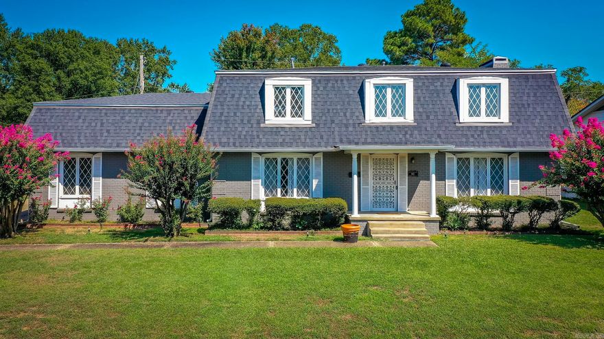 Discover elegant, spacious living in this bright and beautiful Park Hill home in one of North Little Rock’s most sought-after historic districts. A grand, light-filled living room features breathtaking floor-to-ceiling windows and abundant natural light.  The main level offers multiple living spaces and a chef-ready kitchen with room to add a prep island. Upstairs includes a private primary suite and three additional generously sized bedrooms.  Enjoy two wood-burning fireplaces, a large patio, and a partially fenced backyard—perfect for entertaining. Classic character and timeless charm shine throughout.