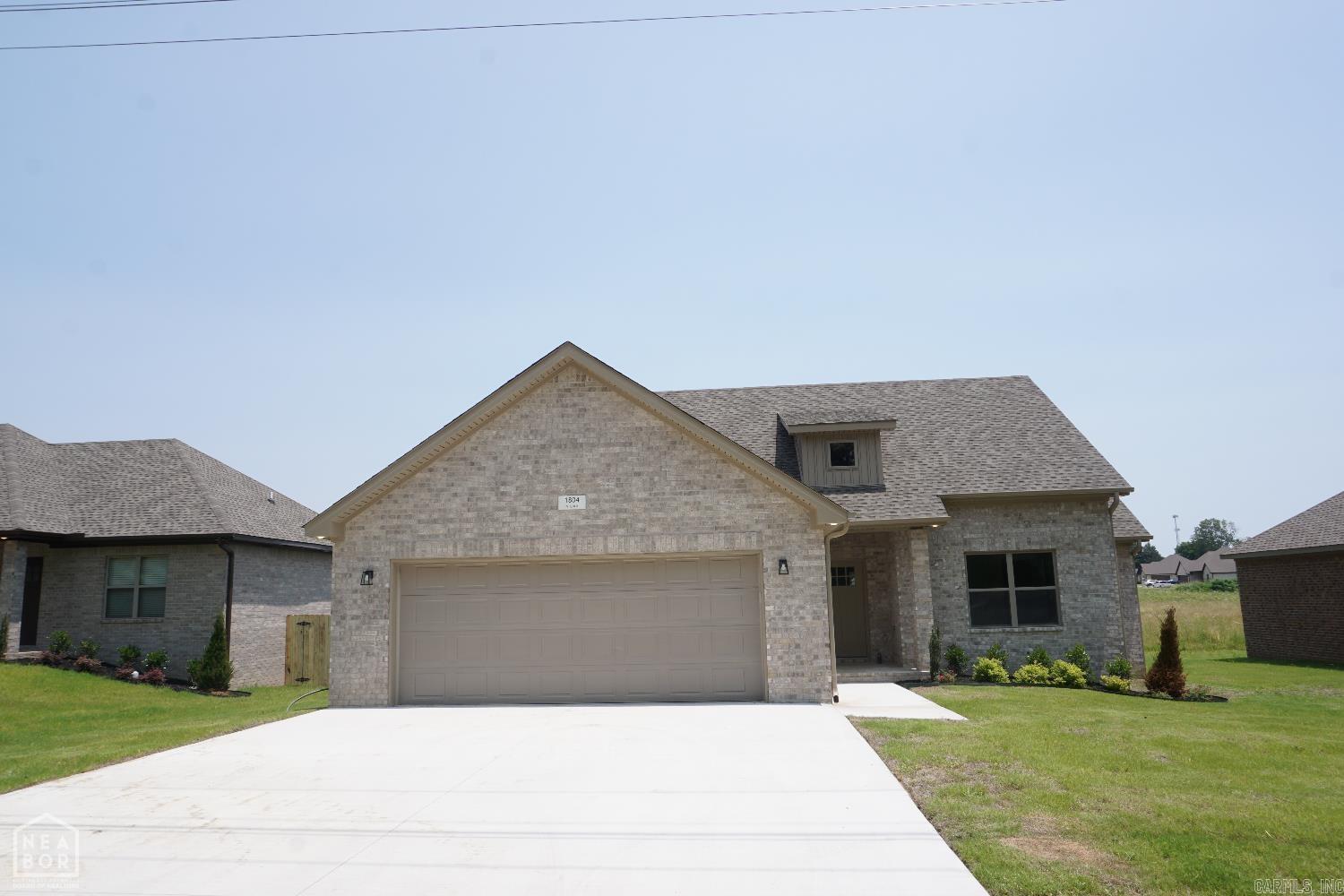 Welcome to your dream home in one of Northeast Arkansas's fastest-growing communities! This newly built 3-bedroom, 2-bathroom home offers modern comfort, stylish finishes, and thoughtful design all nestled in a quiet, family-friendly neighborhood in Brookland, AR. Step inside to find an open-concept layout with plenty of natural light, a spacious living area perfect for entertaining, and a beautifully appointed kitchen featuring stainless steel appliances, custom cabinetry, and granite countertops. The primary suite boasts a large walk-in closet and a private bath with dual vanities and a walk-in shower. Two additional bedrooms and a second full bath provide space for family, guests, or a home office. Enjoy the peace of a quiet street while still being just minutes from local schools, parks, and amenities. Whether you're a first-time homebuyer, downsizing, or relocating, this home offers the perfect blend of small-town charm and modern convenience. Don't miss your chance to own a piece of the booming Brookland community schedule your showing today!