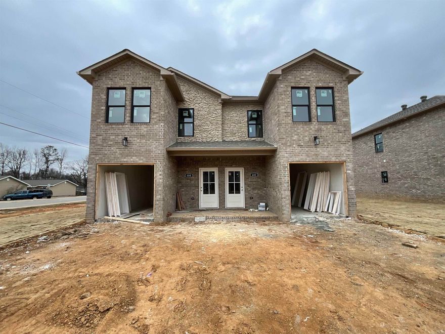 Look at these beauties! All brick/stone NEW CONSTRUCTION DUPLEXES in the heart of Jacksonville! Each unit is 3bed/2 1/2 bath! One car garage opens into the downstairs living space with a half bath for convenience. Upstairs contains primary bedroom at the back with its own bathroom and walk-in closet, as well as two additional bedrooms with a bathroom in-between. Hall laundry makes for the ultimate in convenience! Luxury vinyl throughout will make this renter-ready! This building has a twin going up next door. Interior photos are from a finished unit nearby. 7 buildings left of these new duplexes! See AGENT REMARKS