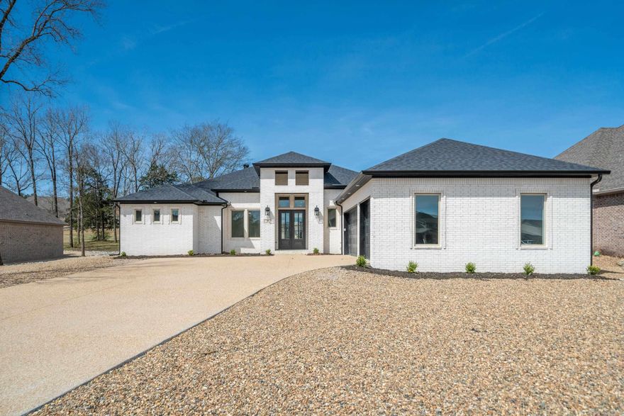 New Construction Isabella Golf Course Contemporary Luxury Experience refined golf-course living in this new construction contemporary home ideally positioned on a level lot along the Isabella Golf Course in Hot Springs Village. Designed with both style and function in mind, this residence offers sweeping golf course views and a seamless indoor–outdoor connection. High-end finishes and attention to details define the upscale aesthetic, while thoughtfully designed living spaces provide comfort and flexibility for everyday living or entertaining. Expansive windows frame fairway views and flood the home with natural light, enhancing the open-concept layout. The kitchen features premium materials, custom cabinetry, and upscale fixtures, complementing the home’s contemporary design. Quality craftsmanship is evident throughout, from the curated finishes to the efficient floor plan that maximizes the level setting and golf-front location. Enjoy the tranquility of golf-course living with the convenience and amenities of Hot Springs Village, including multiple golf courses, lakes, trails.  Taxes are based on unimproved lot, consult the county assessor for taxes with home constructed.