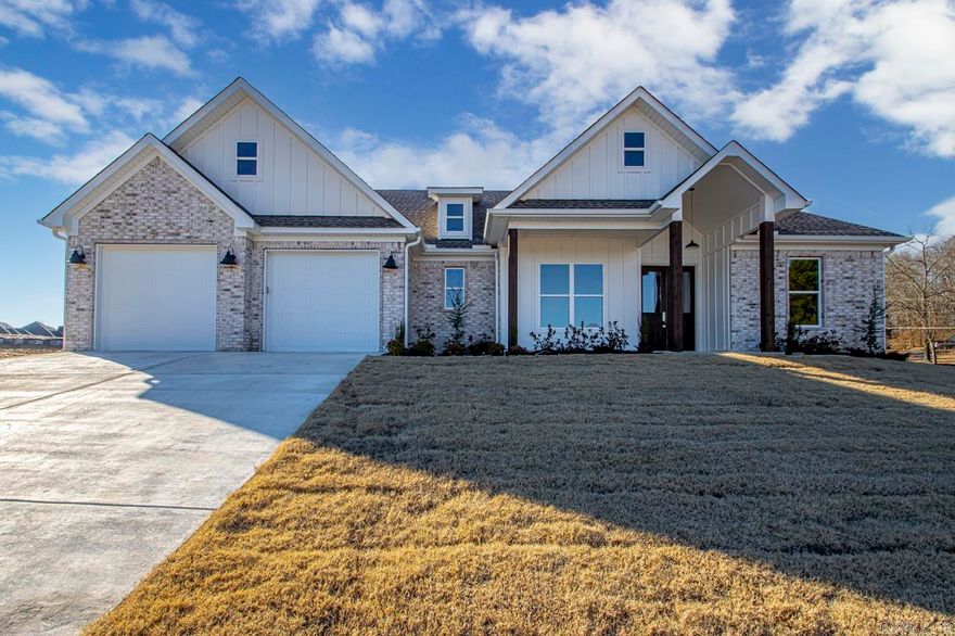 This home has office /formal dining. Kitchen with large island custom painted cabinets, with large pantry, over looks great room with fireplace. Master has custom ceiling, with large walk in tile shower, master closet goes into laundry room. Large covered back porch. Harmony Village can join Silver Springs County Club, has golf, pickle ball and a pool.