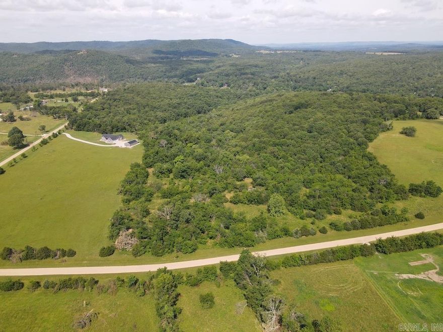 Nestled in the gorgeous rolling hills amongst the White River Valley is a gorgeous building tract with incredible amenities. Part of the planned community of the White River Valley Estates, this gem is sure to impress. Fronted on 2 sides by paved county roads, the access is phenomenal and easy. Several acres of the land is premium pasture with the remainder being comprised of mainly hardwood timber. Some smaller timber and brush areas could easily be removed to create an ideal building site tucked away for excellent privacy and seclusion. The land is very level and sits atop a valley and with some clearing a great view of the Ozarks landscape could be the canvas for your dream home. The property is located a few minutes from Mountain Home, AR, Gassville, AR, and the famous Cotter, AR. These communities provide all the features one could ask for… premium dining, shopping, entertainment, and more. This unique community lends itself to a very tranquil and comfortable lifestyle to enjoy all the benefits of the lovely outdoors and majestic White River. This world-renowned river boasts some of the best and most consistent trout fishing anywhere on the planet.