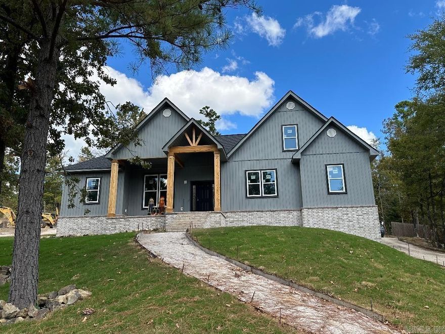 Please overlook our progress — under construction. BUILT WITH PRIDE & ENTHUSIASM. This new construction is built with passion to bring quality, style, and comfort at an affordable price. Upon approaching this modern country-style home, you're welcomed by the towering cedar columns/beams at the front entrance. The main level features a split floor plan that will draw you into an open space with tall vaulted ceilings, a fireplace surrounded by shelving, and a spacious living/dining/kitchen combo designed to entertain. The huge covered patio just beyond the viewing window is the perfect place to continue entertaining or to enjoy a lazy day. The master suite offers enough space for a getaway. You'll have to see the master bath and master dressing closet for yourself. The laundry room is oversized and easily accessible as well as the garage. You will also find two bonus rooms upstairs that can serve as additional bedrooms, game room, office, craft room, media room, or whatever your heart desires. You'll also find a third bathroom and more storage/closets. Come now to choose your finishing touches (lighting, post/shiplap stained or left natural--there's still time for custom finishes).