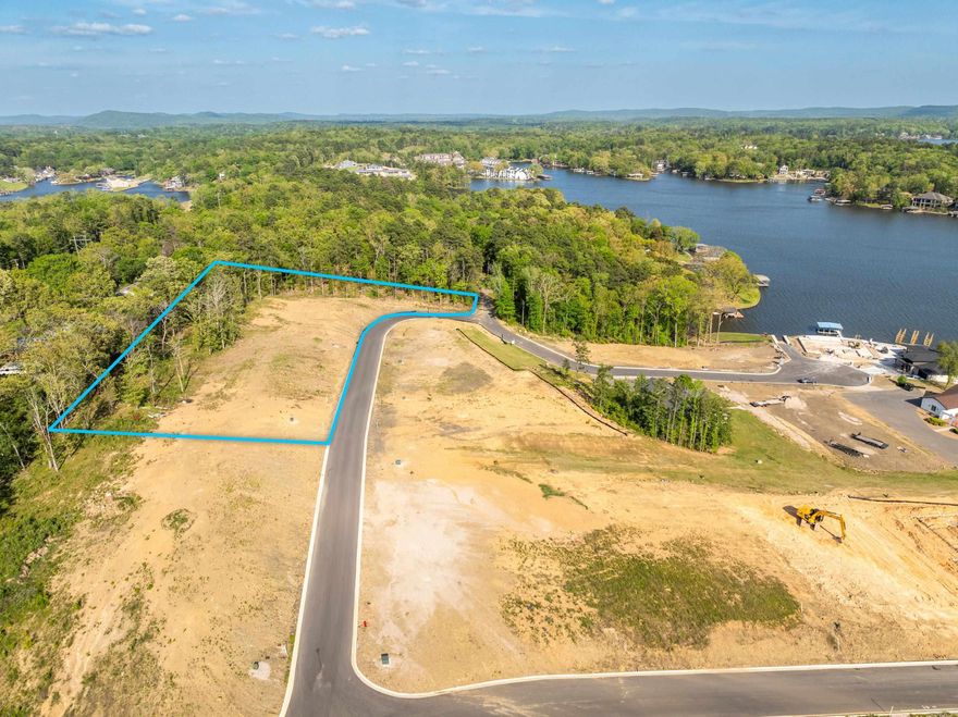 Discover an incredible opportunity with this 3.446-acre lakeview tract in a gated subdivision overlooking beautiful Lake Hamilton in Hot Springs, Arkansas. Enjoy stunning panoramic views along with deeded lake access and a private boat ramp—perfect for making the most of lake living.  All utilities have been installed and are available at the curb, making this property ready for development. The gently rolling terrain offers multiple ideal build sites and flexibility for a variety of uses.  Whether you’re looking to subdivide into residential lots or develop a condo or townhome community, this tract offers excellent investment potential in a highly desirable area.  Bill of assurance and POA terms are negotiable depending on purchase arrangements. Enjoy the privacy of a gated neighborhood just minutes from downtown Hot Springs, shopping, dining, and entertainment. Rare opportunity—don’t miss it!