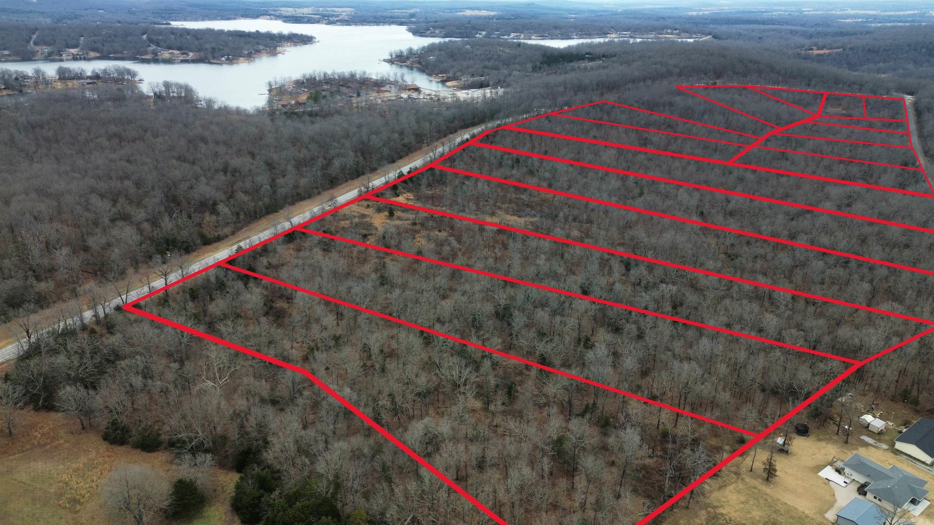 Looking for the perfect pieces of land in Horseshoe Bend, Arkansas? Lot 10, consisting of 2.55 acres and Lot 11 at 2.55 acres, these recreational lots reside in the Crown Lake Estates. They offer excellent opportunities for those seeking a beautiful home site, vacation retreat, or smart investment property. Priced at $14,900 each, these spacious lots boast road frontage off AR-289 N with city water, electric, and sewer readily available, making it easy to develop. Situated in the heart of the Ozark Mountains, Horseshoe Bend is a sought-after destination known for its natural beauty, outdoor recreation, and peaceful lifestyle. With Crown Lake just minutes away, residents can enjoy boating, fishing, and water sports on this stunning 640-acre lake. The area is also home to the Turkey Mountain Golf Course, an 18-hole championship course that attracts golf enthusiasts from across the region. For those who love the great outdoors, the Strawberry River offers excellent fishing and canoeing, providing endless opportunities for adventure. These lots are just two of several available. For more information, contact me today! Learn more about the area: Arkansas.com/HorseshoeBend