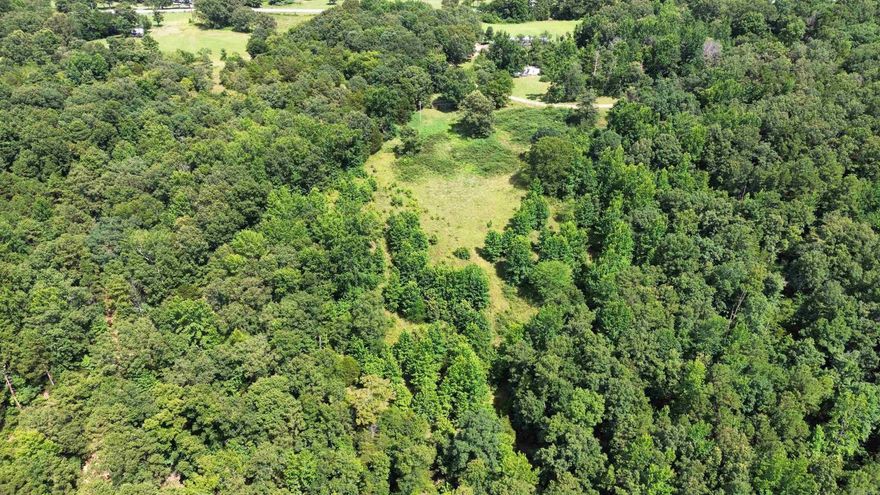 Located in the heart of the Ozark Mountains of Melbourne, Arkansas, this 18.71-acre property sits just off County Road 58 on Fisher Road. This land offers the perfect blend of privacy and convenience to nearby amenities. The famous White River resides only 4 miles away, making it an ideal retreat to fish and embrace the beauty of the Ozarks.  Property has one small pond on it, In addition, city water and electricity are available, providing you with the essential utilities you will need to start building right away. Enjoy the rolling hills, natural beauty, and abundant wildlife that make this area so special.  Whether you’re looking to build, hunt, or simply escape to the rural countryside, this property is ready for you. Don’t miss this rare opportunity to own a beautiful piece of the Ozarks at an affordable price of only $64,000!