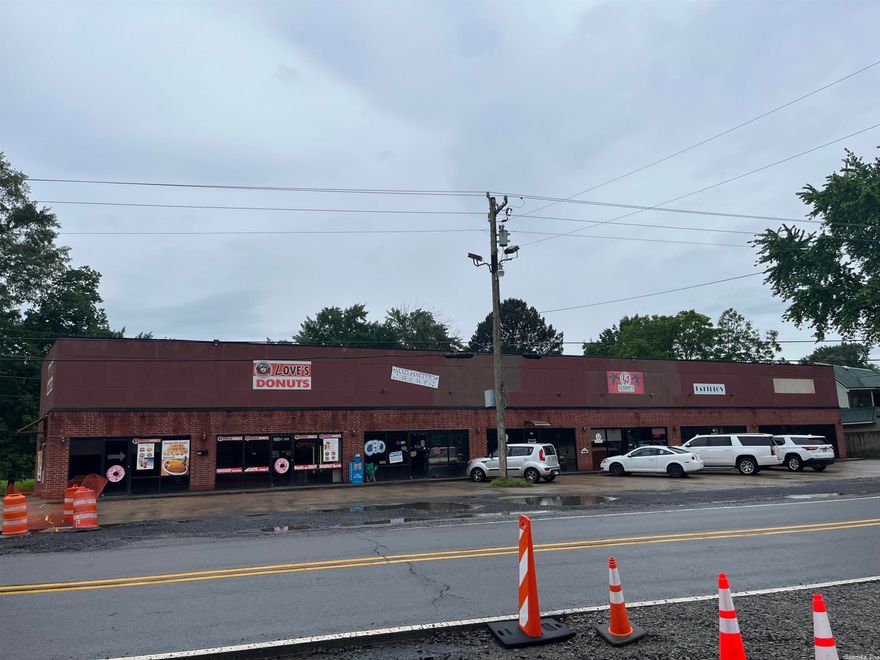 GREAT INVESTMENT PROPERTY in growing town just outside of Cabot!  Has 7 seperate units all occupied at this time! Building is all brick & located on busy main street! Donut shop, hair salon, tanning, tatoo parlor are all located there at this time! This building has many available uses! Currently brings in a good income monthly! Make your money work for you with this wonderful property!