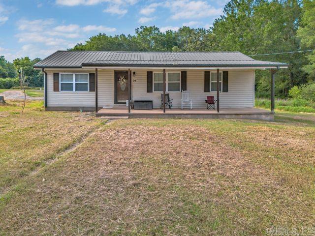 Three-bedroom, one-bath, 1,057 sq ft home on approximately 14.5+/- unrestricted acres, located just minutes from town and I-40. Enjoy excellent hunting with an established food plot and planted oak trees, fishing in your own stocked pond, and two creeks. The property also features a 30x30 Red Iron shop with two bay doors and a storm shelter for added peace of mind. ***AGENTS SEE REMARKS***