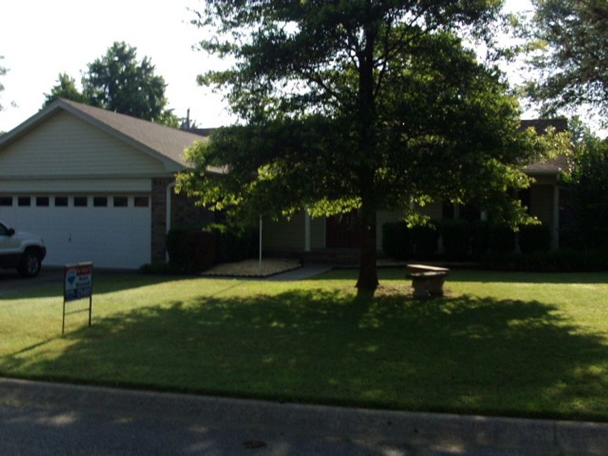 Pella replacement windows in house.  Pella double front doors.  Fireplace with gas logs.  Storm cellar in back yard.  Fully fenced back yard, deck and storage building.