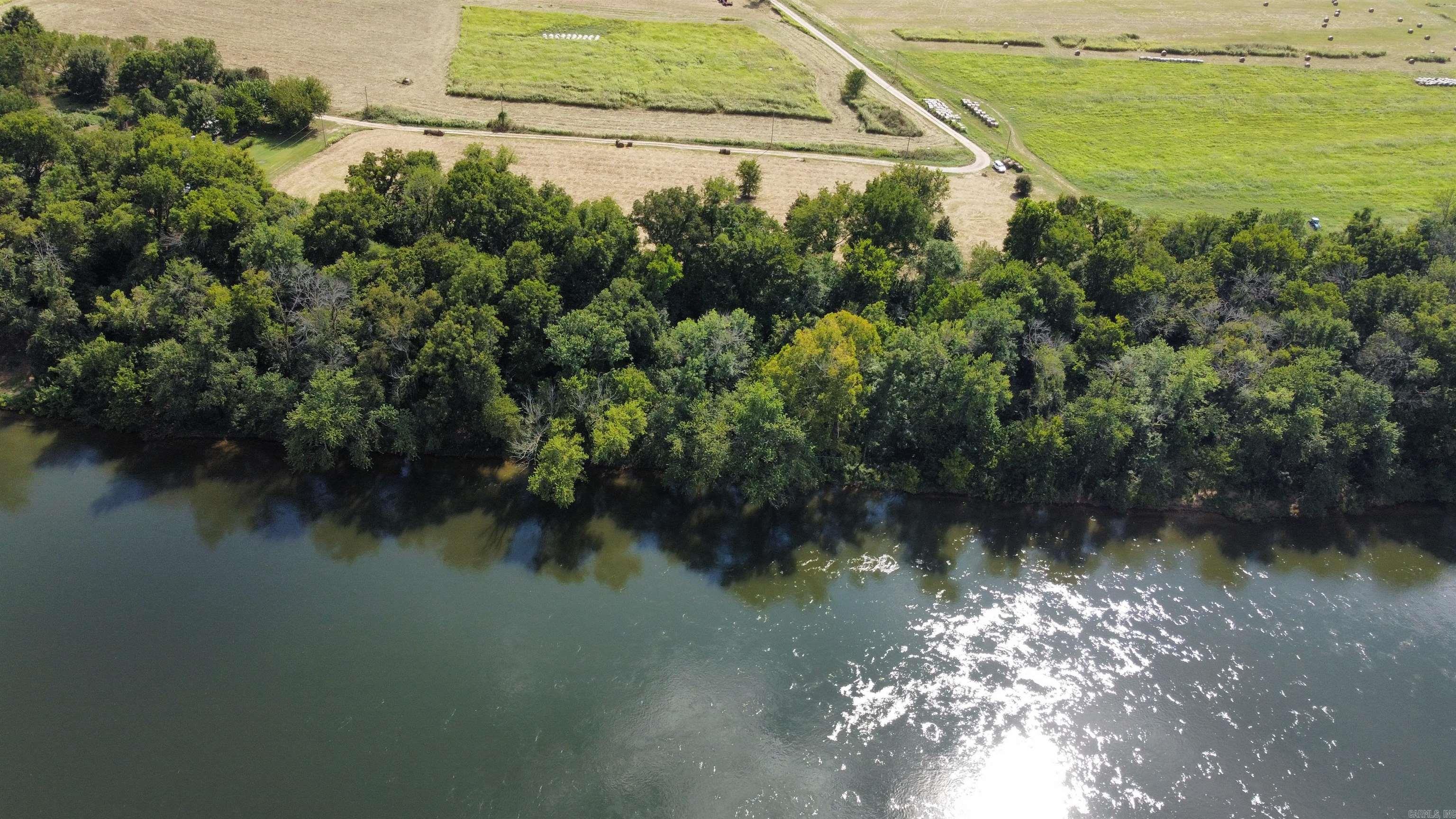 White River Getaway! This property is located on the famous White River, with gorgeous bluffs across the river and beautiful mountains as your background. Sit back and relax and watch the river flow by, or launch your boat from the very close public boat ramp, and fish for supper. Electric, water, phone and fiber optic available.