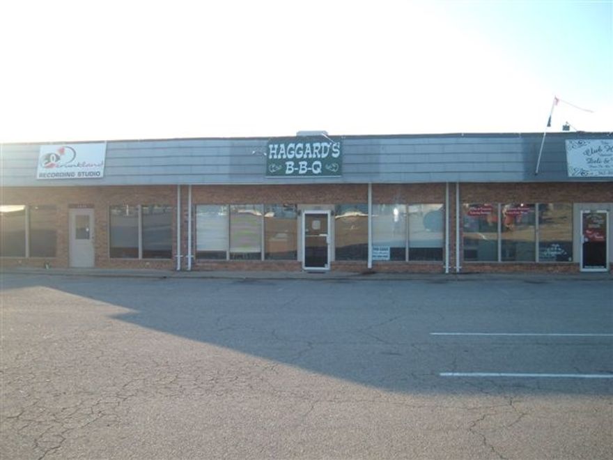 Very nice end spot in small strip mall, set up for a beauty shop.  No equipment included.  Great location and just minutes from downtown and close to Wal Mart and restaurants.  Ample parking spaces for use as parking lot is large.