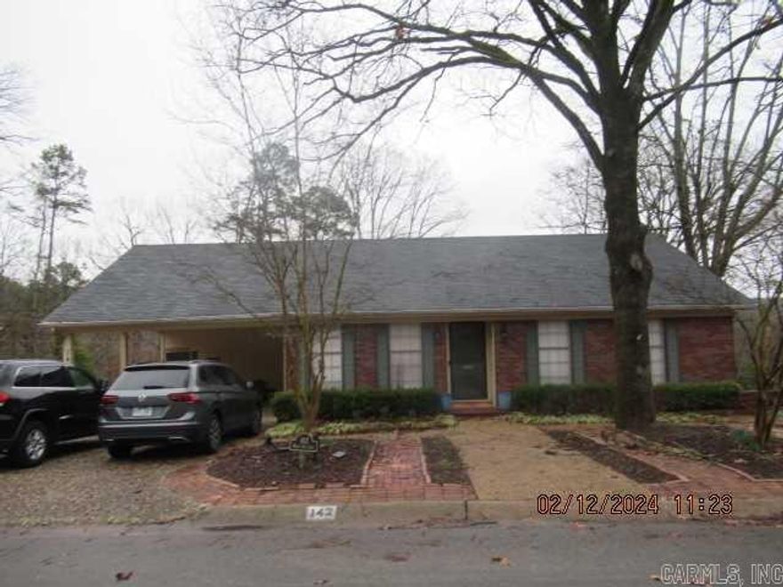 Newly updated interior, refinished hardwood flooring and updated tile flooring in bathrooms, kitchen.  Built-in shelves in living room and pantry.