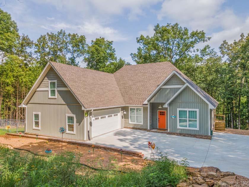 FOR SALE! ONE OF A KIND! Greer's Ferry Lake Front Property In the quiet Mystic Isle subdivision, the home has high speed fiber wi-fi, smart thermostat, smart garage doors, and a smart keypad entry. It’s really smart! Enjoy some peaceful time here and allow others when you're not! Built in 2024, this 2800sqft home has all new everything! 4 Bed, 2.5 Bath, 1 Office, 1 Bonus Room, 2 Car Garage, 16 x 16 Storage/Shop, Private Path & Beach. It’s natural rock landscaping and fireplace coupled with lake access make this a dream home for anyone!