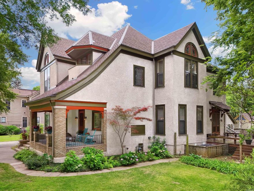 This historic charmer boasts an array of unique features and amenities that blend timeless charm with modern convenience. Features include 12' ceilings, fresh exterior paint, a grand foyer, front and back parlors, sunroom, parquet wood flooring, antique downstairs lighting, transom windows, and Spanish Cedar wood doors. The kitchen is a chef's dream with a Lacanche dual range oven, butler's pantry, and marble and stainless steel counters. Exterior features include a carriage house that is a 1 / 3 apartment with the rest storage that can easily be converted into a garage, in-ground sprinklers, and landscaping. This Quapaw Quarter home is located near Pettaway Square and the SoMa District, offering easy access to downtown dining, shopping, museums, parks, and The River Market. Family and pet-friendly is a great way to describe this tight-knit neighborhood. This property is not just a house; it's a lifestyle, offering everything one might desire for sophisticated urban living, with a quaint, historical charm. See attached videos for 3D tour and aerial drone footage. See attached documents for the fascinating history of home.