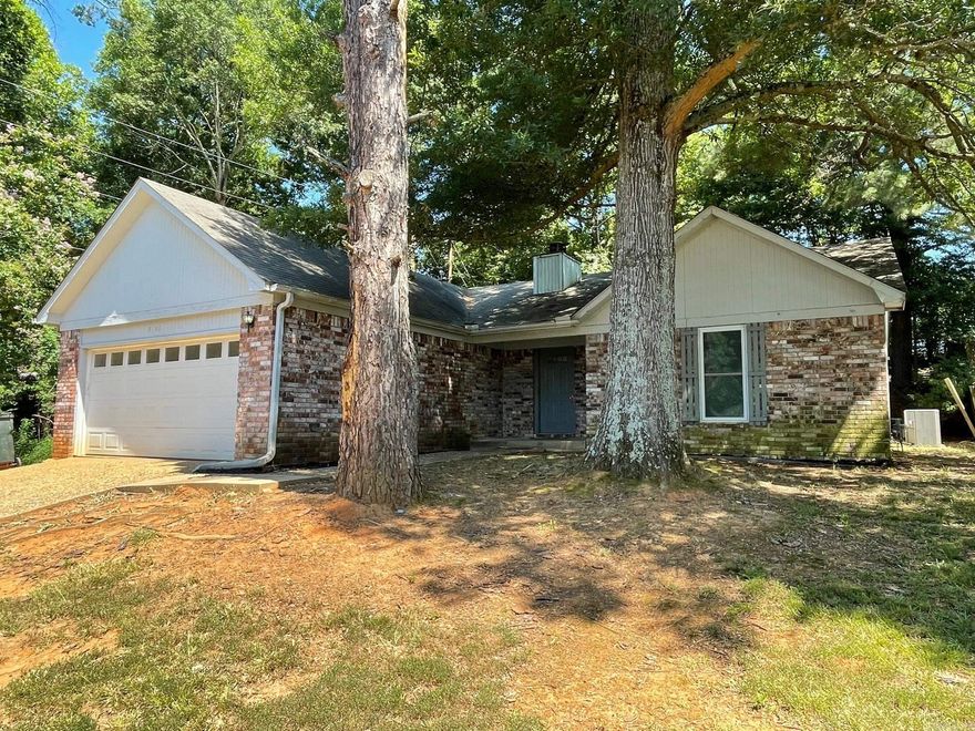 This newly painted house features new floors, granite countertops, and a two car garage! Refrigerator is included!