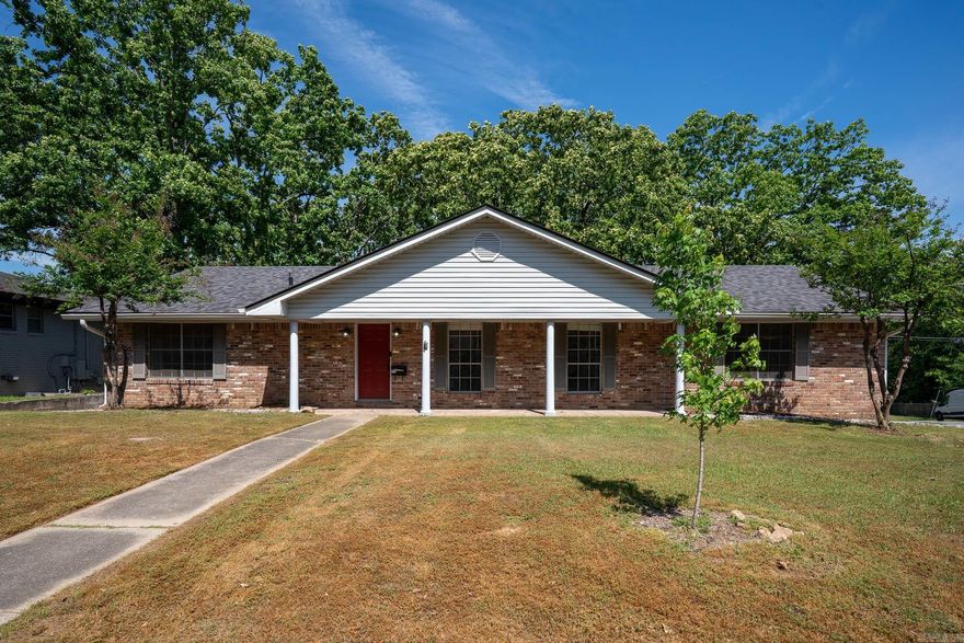 Welcome to this charming home in the highly sought-after Lakewood Subdivision! This 3 bedroom 2 bath home sits proudly on a desirable corner lot and offers comfort and convenience in one of North Little Rock's most established communities. Interior includes hardwood floors, new backsplash in kitchen, spacious utility room, new paint. Exterior has large back yard with shop/storage, beautiful trees, and only five minutes from The Old Mill one of Arkansas historic re-creations and most recognizable landmarks that even appeared in Gone With the Wind! You'll enjoy easy walk to one of the area's most beloved landmarks and scenic spots as well as trails to walk around the lake.   Residents of Lakewood community enjoy access to fantastic neighborhood amenities including a pool, tennis courts, and playground. This home is perfectly priced at $215,000, making it an excellent opportunity for investors or first time home buyers. Don't miss out on this amazing opportunity today! Agents see remarks.