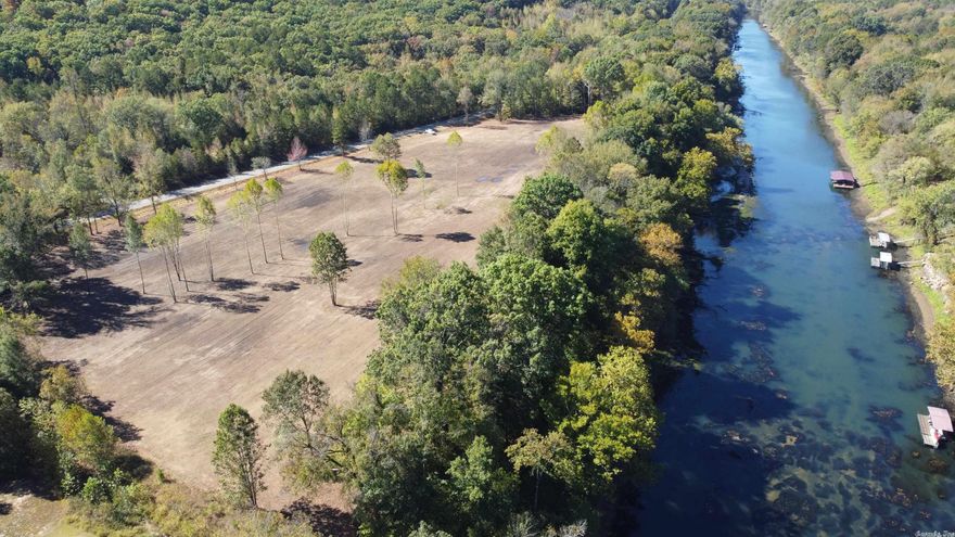 Over 1100' of beautiful river frontage property on this 16 acre piece of property.  Nice level ground and already cleared for you to start building.  This property is surveyed up in 3+ acre tracts.  No cherry picking the middle or it can be purchased as a whole.  A 3 acre tract price will start at $199,000 and price will be based on how much acreage you want to purchase. 3 acre tracts must run from the river to the highway. NO MOBILES, PREFABS OR RV'S ALLOWED!