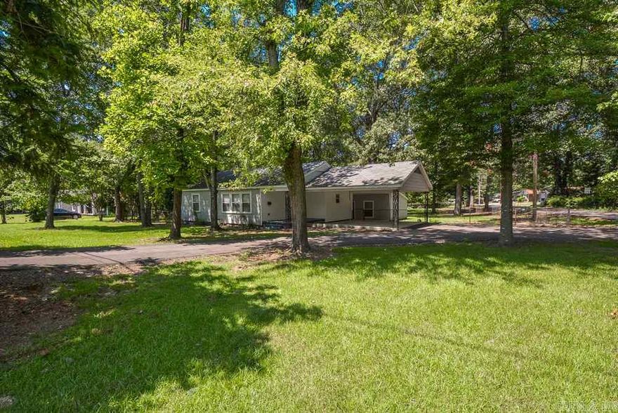 Country Living in the City. Updates -roof, HW tank, electrical, plumbing, windows, refinished hardwoods, interior/exterior paint, foundation vents, fixtures, carpet. Kitchen –cabinets, granite tile counters, SS appliances, tile. Bathrooms –tile shower, vanity, commodes, tile floors. Main house 3 Bedroom 1 Bath, separate living quarters -4th Bedroom w/ ½ Bath, Bonus Living, In-law or Teen quarters. Outside storage & workshop on .60 acre lot. Fully fenced, tons of parking, covered breezeway & big front porch.