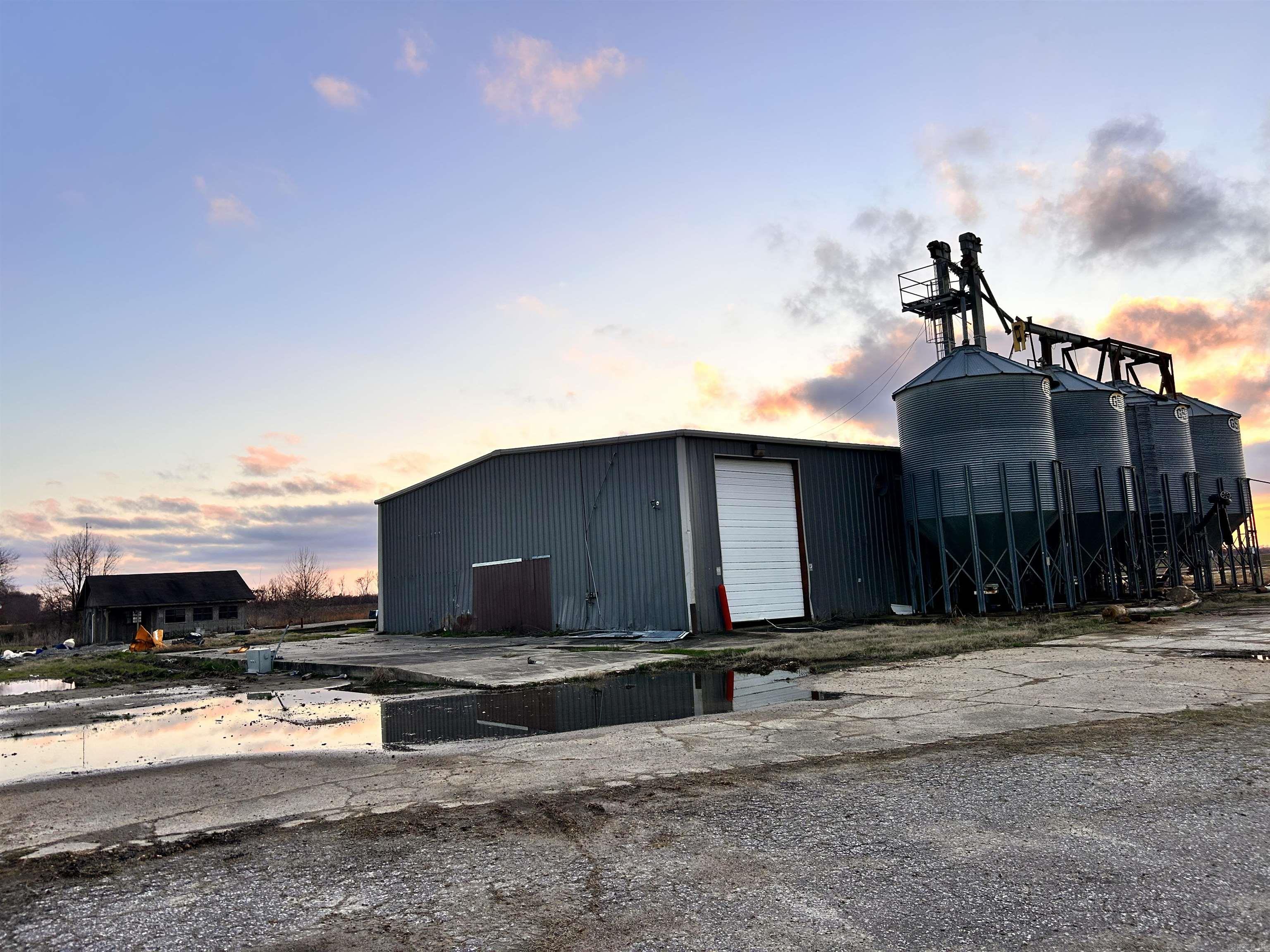 If you are looking for your next investment, covered storage for projects or somewhere to park hunting equipment, look no further! 2.98 acres located just off Hwy 1 N in Cherry Valley. 4,800 square foot warehouse, 648 square foot office building with full bathroom. In and Out driveway, multiple concrete pads, drive over scale. Property backs up to rail road. 3PH 480Amps electrical. Former Valley Mills Rice Mill. Grain bins are being removed.